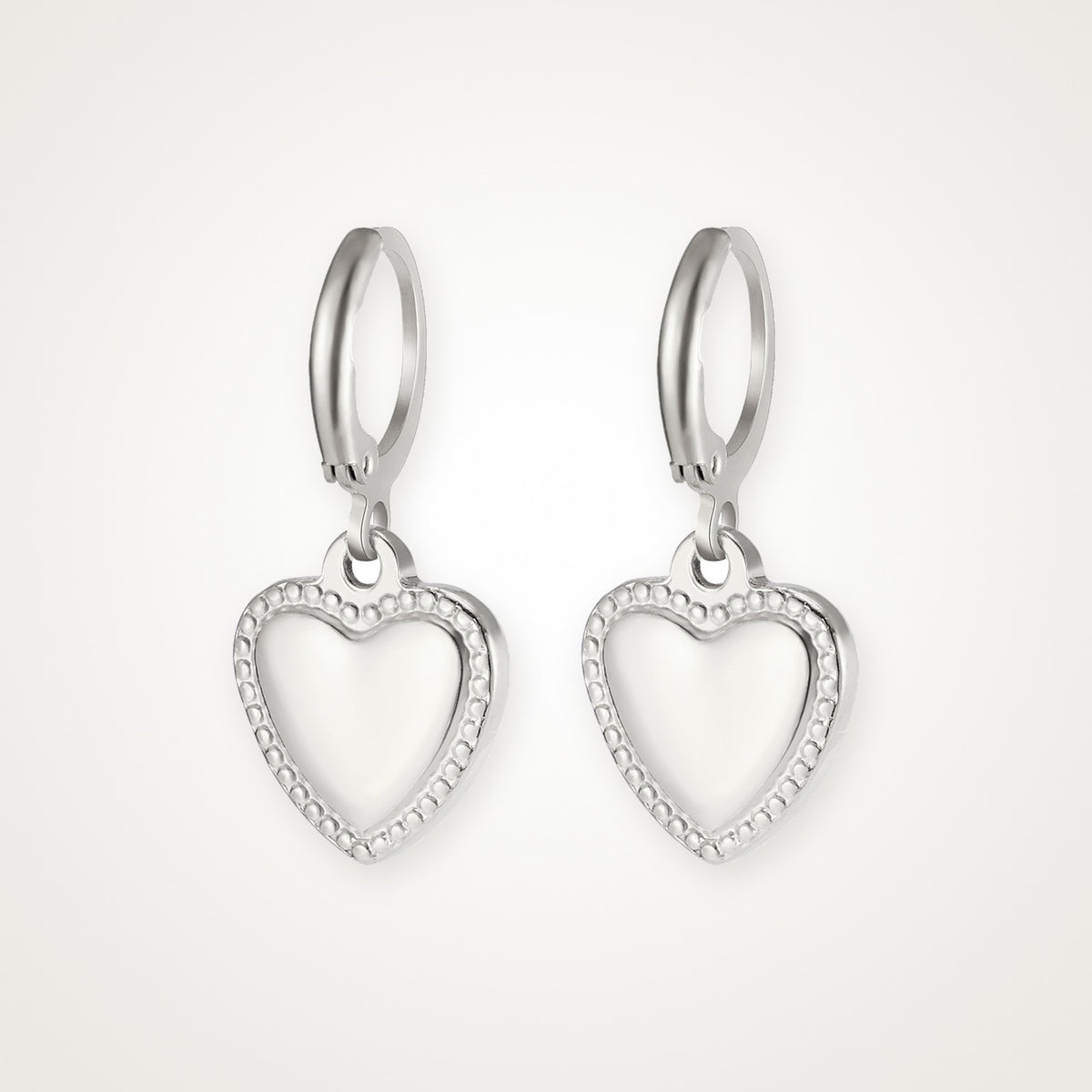 Aretes Corazón acolchado plateados