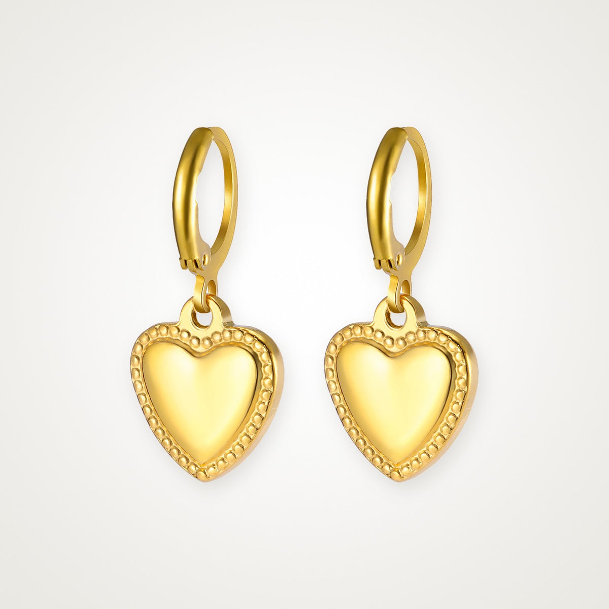 Aretes Corazón acolchado dorados