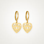 Aretes Corazón con ojo dorados