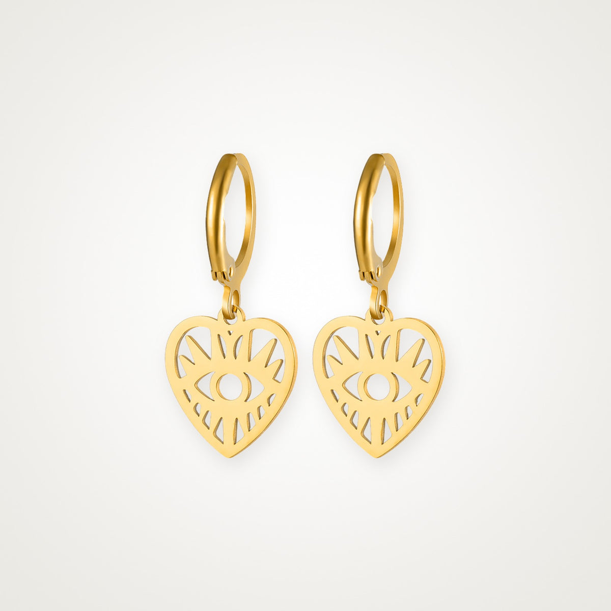 Aretes Corazón con ojo dorados