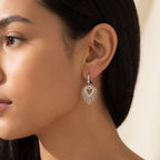Aretes Corazón de sol plateados puestos