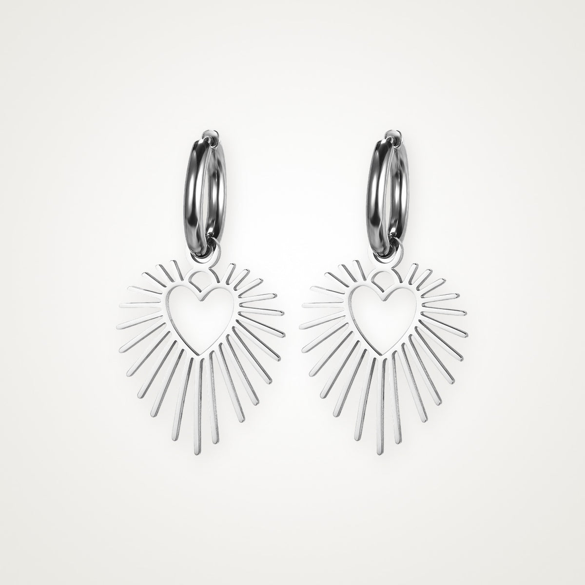 Aretes Corazón de sol plateados