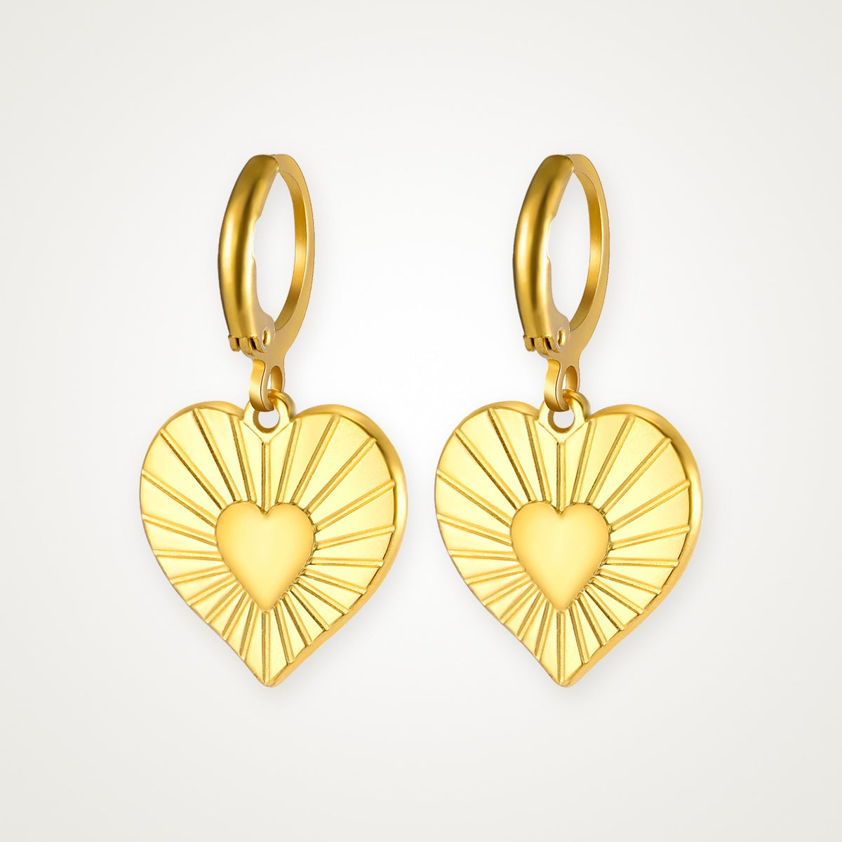 Aretes Corazón radiante dorados