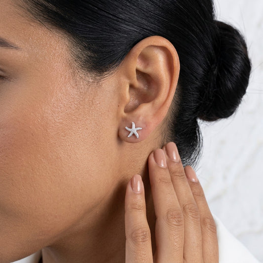 Aretes Estrella de Mar Delicada con Zirconias