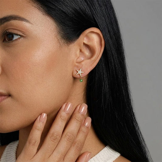 Aretes Estrella de Mar Dorada con Zirconias