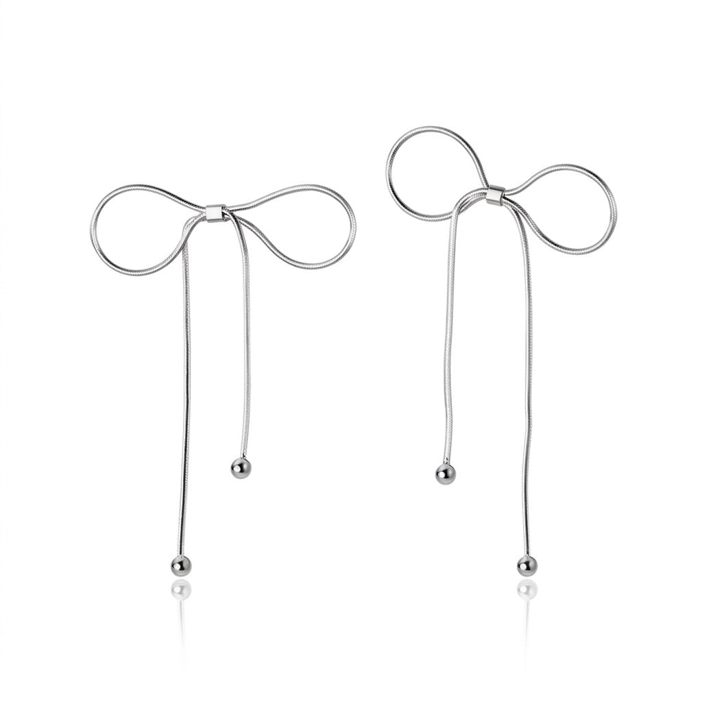 Aretes Moño con Flecos