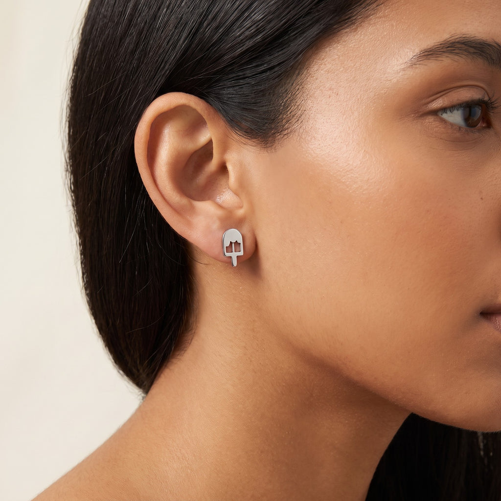 Aretes Paleta helada plateados puestos
