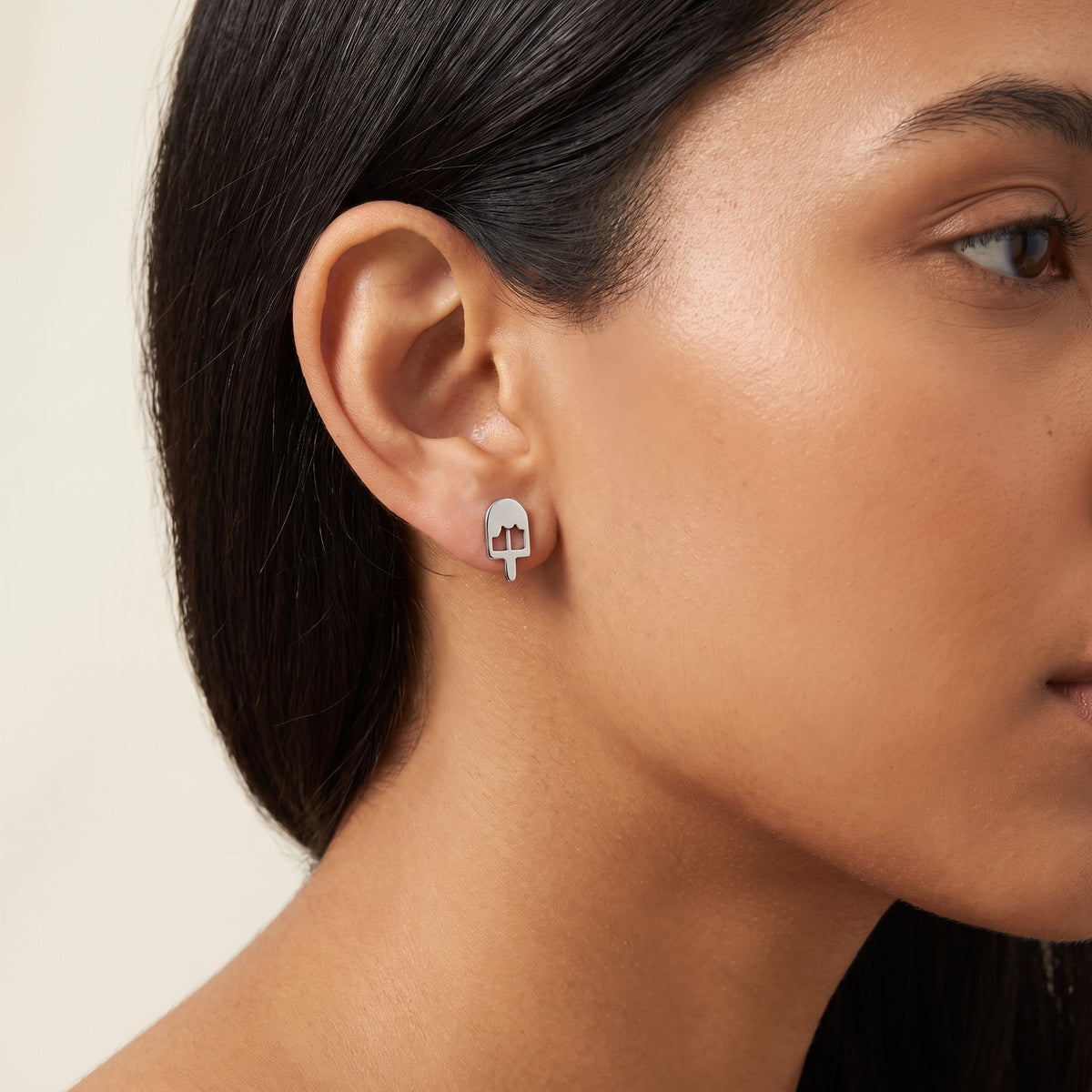 Aretes Paleta helada plateados puestos
