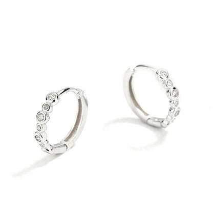 Arracadas con Dije Redondo de Zirconia