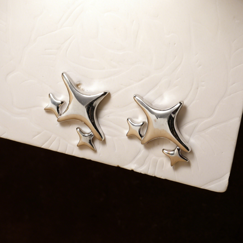 Aretes Estrella de Zirconia en Plateado o Dorado