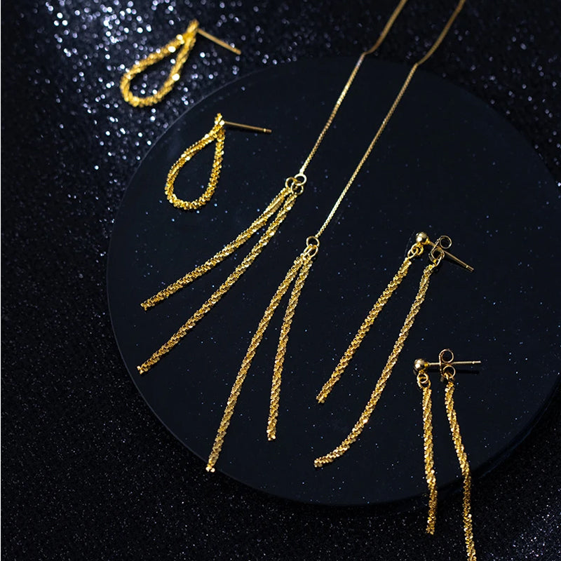 Aretes Estrella con Cadena Colgante