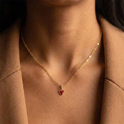 Dije Corazón Rojo y Moño con Zirconias Rosas