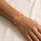 Pulsera Cadena serpiente dorada puesta