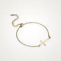 Pulsera Cruz de lado dorada