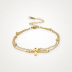 Pulsera Cruz dorada