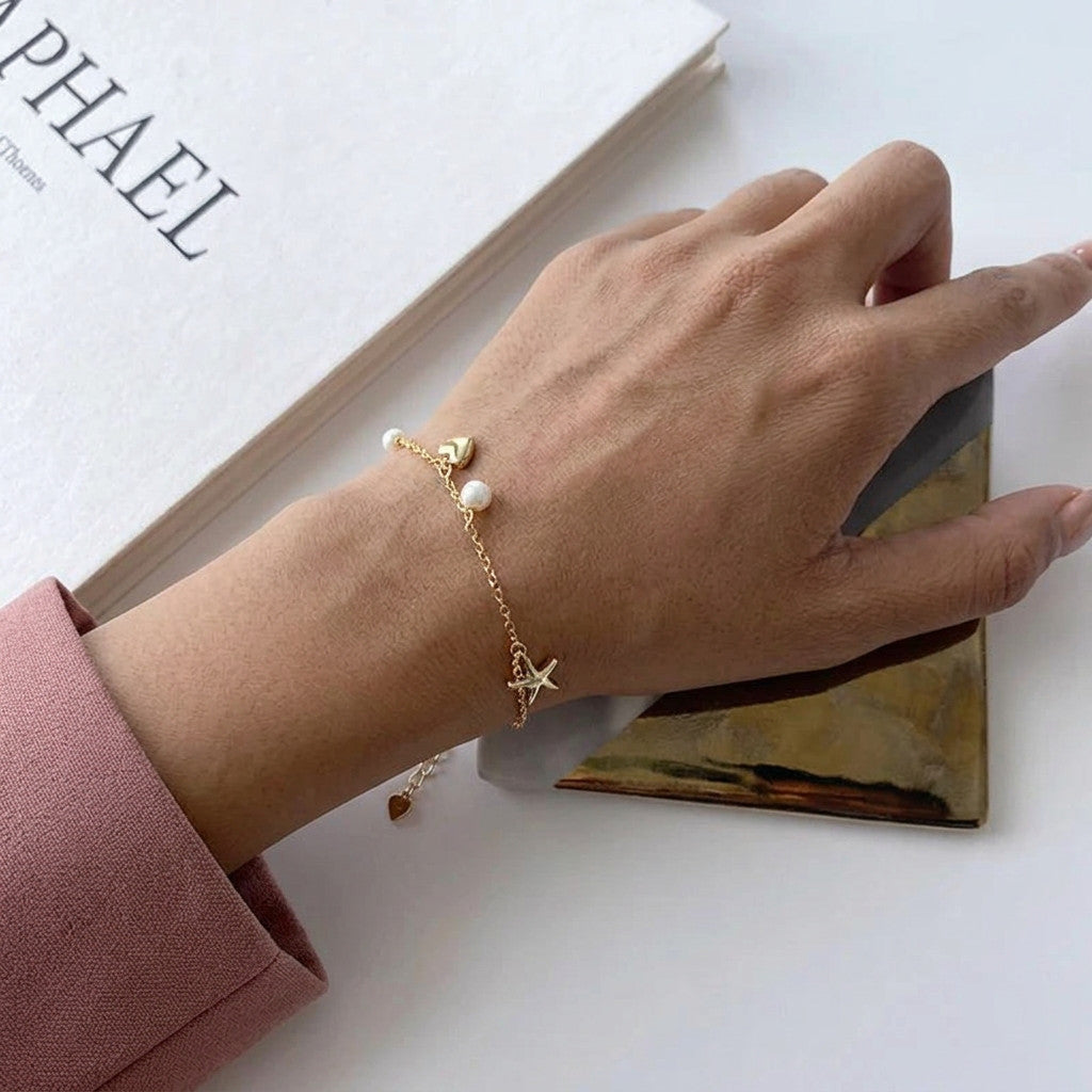 Pulsera de Esferas con Estrella y Concha