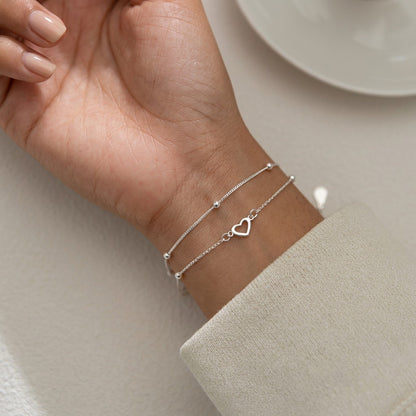 Pulsera Doble Cadena con Corazón