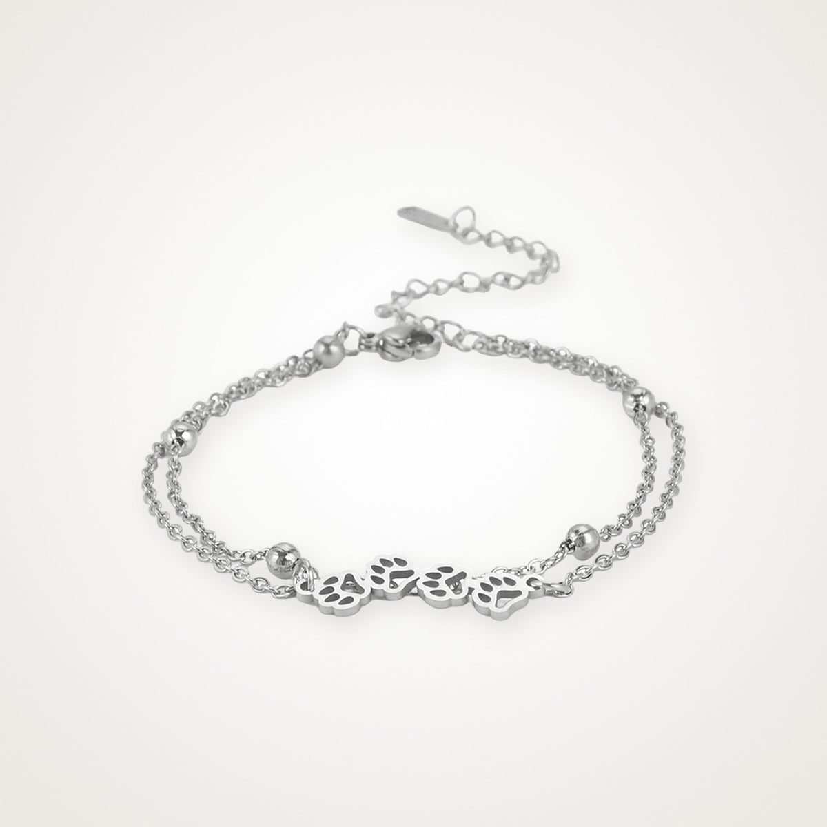 Pulsera Huellitas plateada