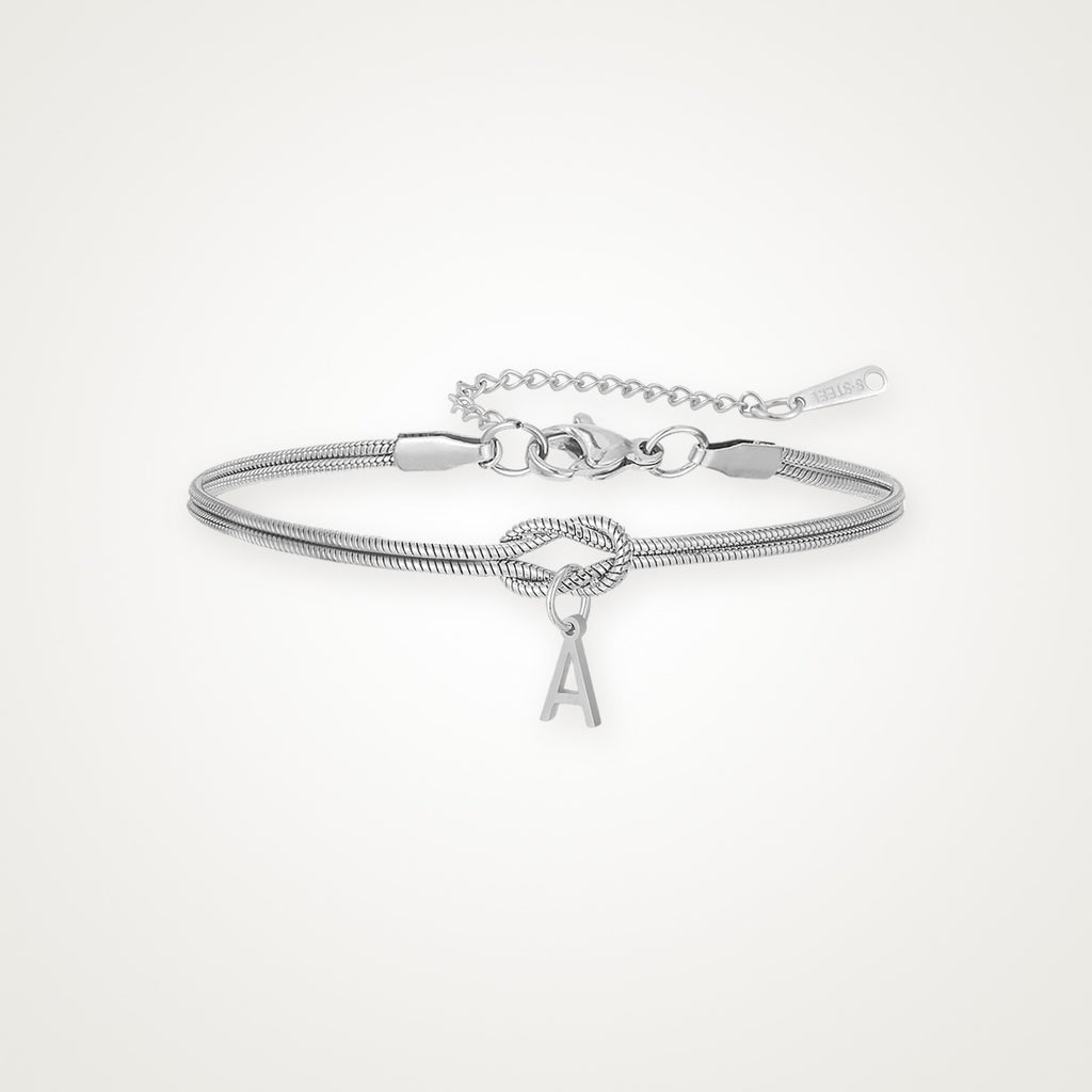 Pulsera Nudo con inicial plateada
