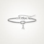 Pulsera Nudo con inicial plateada
